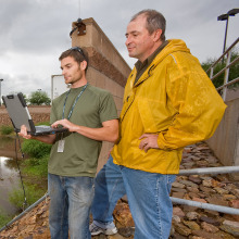 David Goodrich and technician monitor hydrologic systems